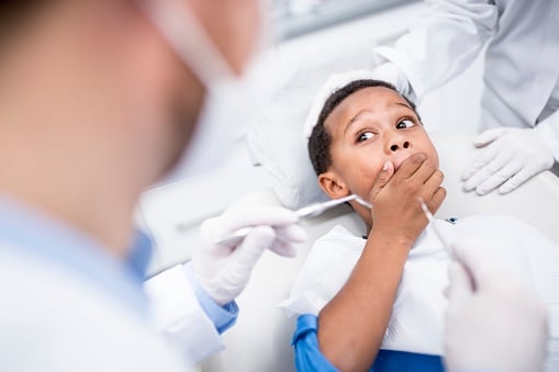 Child not letting dentist